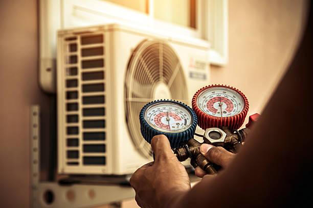 Professional Hvac technician working in Benton, TN